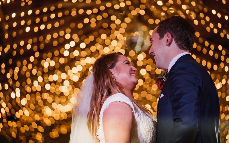 Ashbarton Estate - Bride and groom with fairy lights at Ash Barton wedding venue Devon 