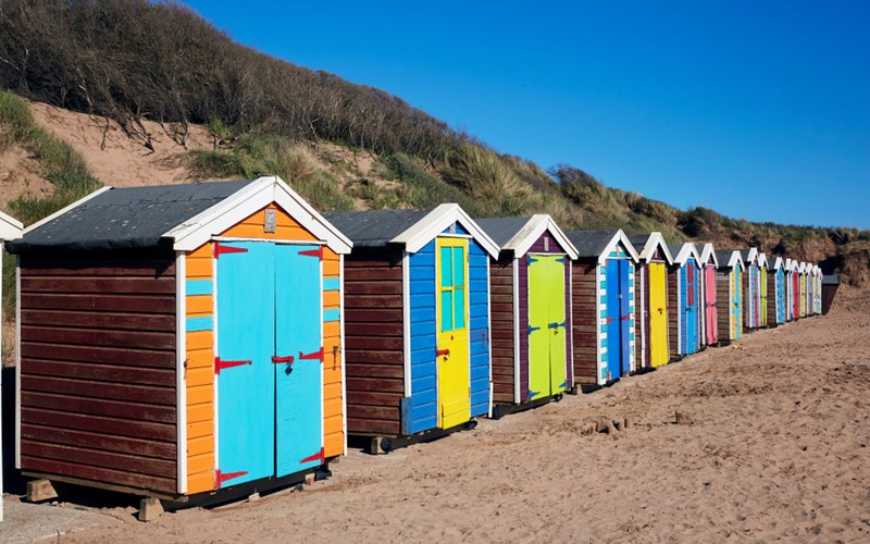 Ashbarton Estate - Ash Barton Estate Wedding Venue beach huts colourful