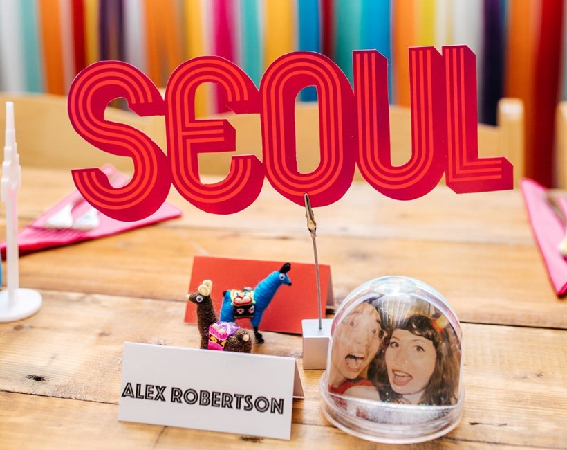 Table name that reads Seoul at Ash Barton wedding venue Devon