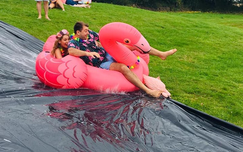 Ashbarton Estate - Ash Barton Estate Wedding Venue slip and slide fun flamingo inflatables