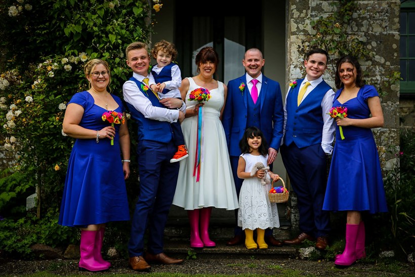 Bride and wedding party in pink wellies