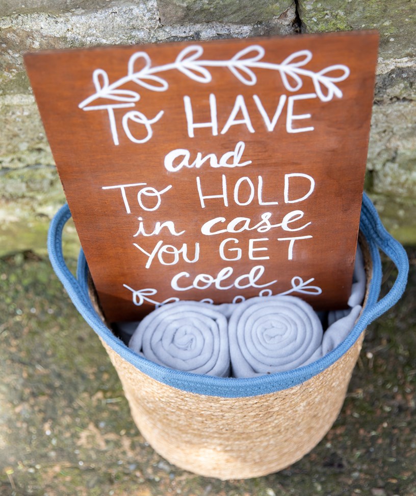 Blankets rolled up in a basket Ash Barton Devon