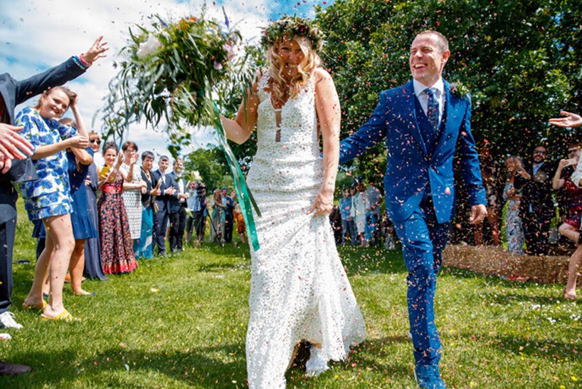 Bride and groom at festival style wedding