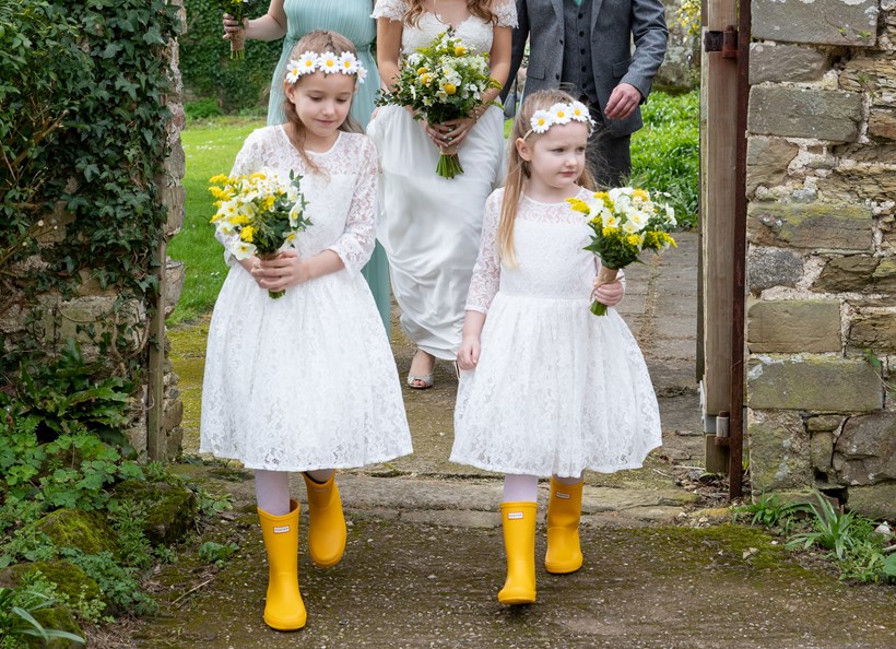 Bridesmaids in yellow wellies