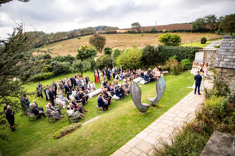 Wedding guests in walled garden at Ash Barton Devon wedding venue