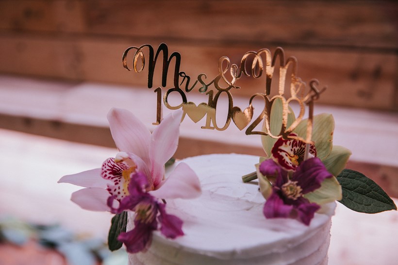 Mrs and Mrs cake topper at Ash Barton wedding venue Devon