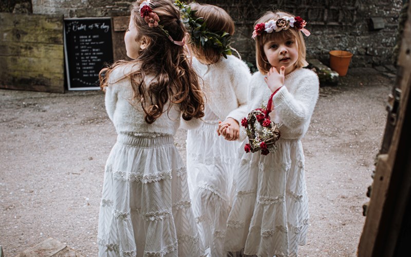 Ashbarton Estate - Three little bridesmaids in white at winter wedding Ash Barton Devon wedding venue