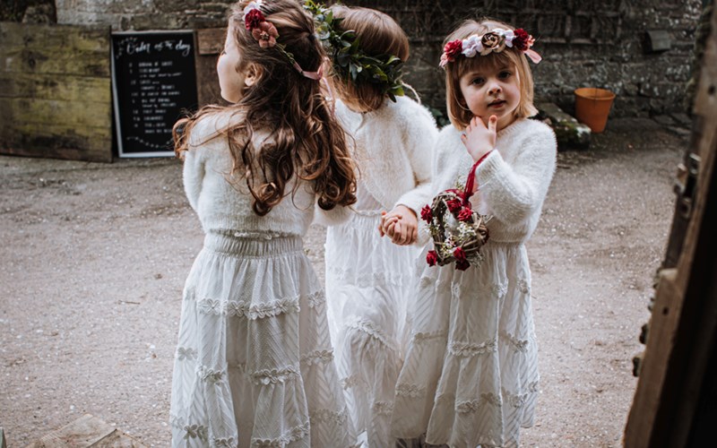 Ashbarton Estate - Three little bridesmaids in white at winter wedding Ash Barton Devon wedding venue  