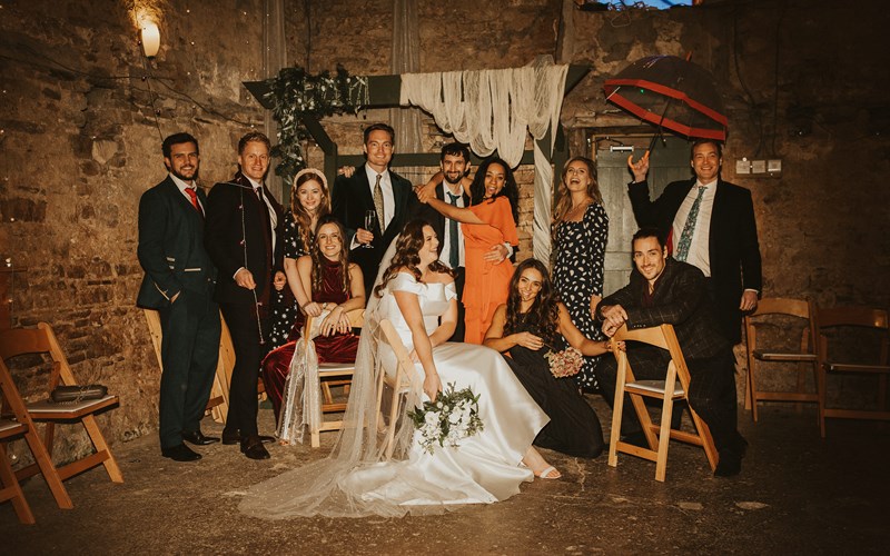 Ashbarton Estate - ride and groom in the old chapel with guest at Ash Barton wedding venue Devon 