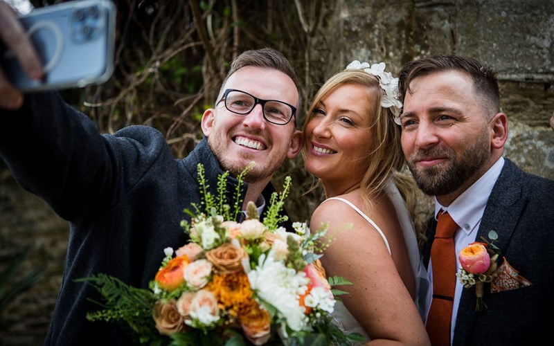 Ashbarton Estate - Bride and groom with a guest at Ash Barton wedding venue Devon