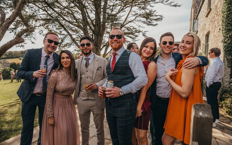 Ashbarton Estate - Wedding guests n the walled garden at Ash Barton wedding venue Devon