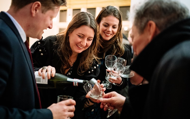 Ashbarton Estate - Wedding guests pours champagne  at Ash Barton wedding venue Devon 