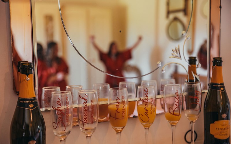 Ashbarton Estate - Glasses of champagne at Ash Barton wedding venue Devon