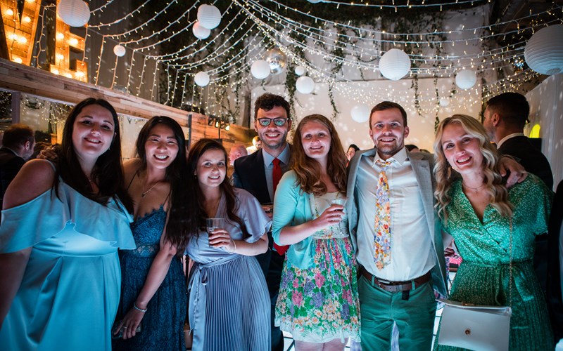 Ashbarton Estate - Wedding guests celebrate in big party barn at Ash Barton wedding venue Devon 