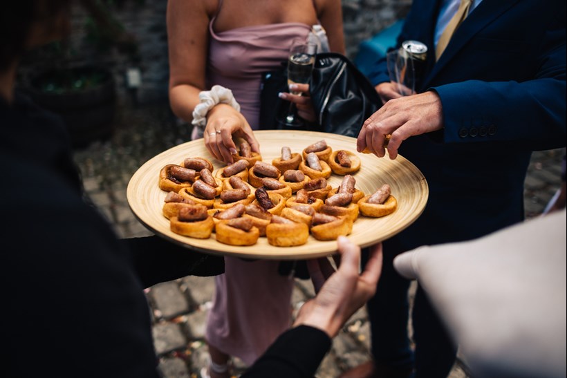 Plate of mini sausage rolls at Ash Barton wedding venue Devon