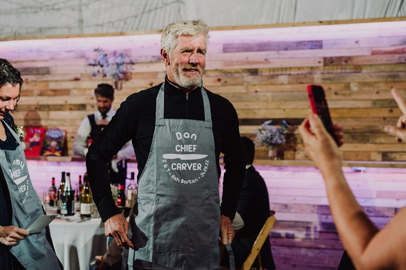 Guess with a grey beard and Apron any Ash Barton wedding venue Devon