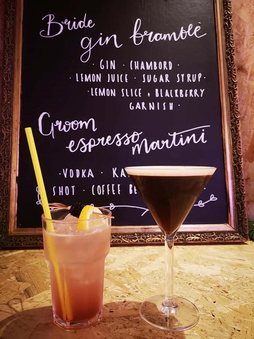 Sign with cocktail options at Ash Barton wedding venue Devon